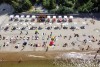«Пекло у холодных волн»: как проходят первые жаркие выходные на пляжах Калининградской области