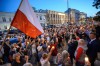 Тысячи поляков зажгли свечи на акциях протеста против судебной реформы