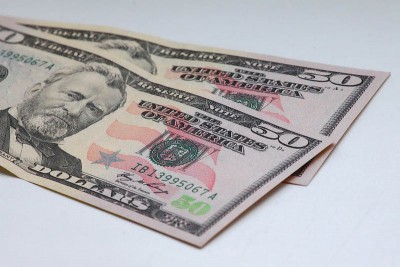 Курс доллара вырос на 12 копеек